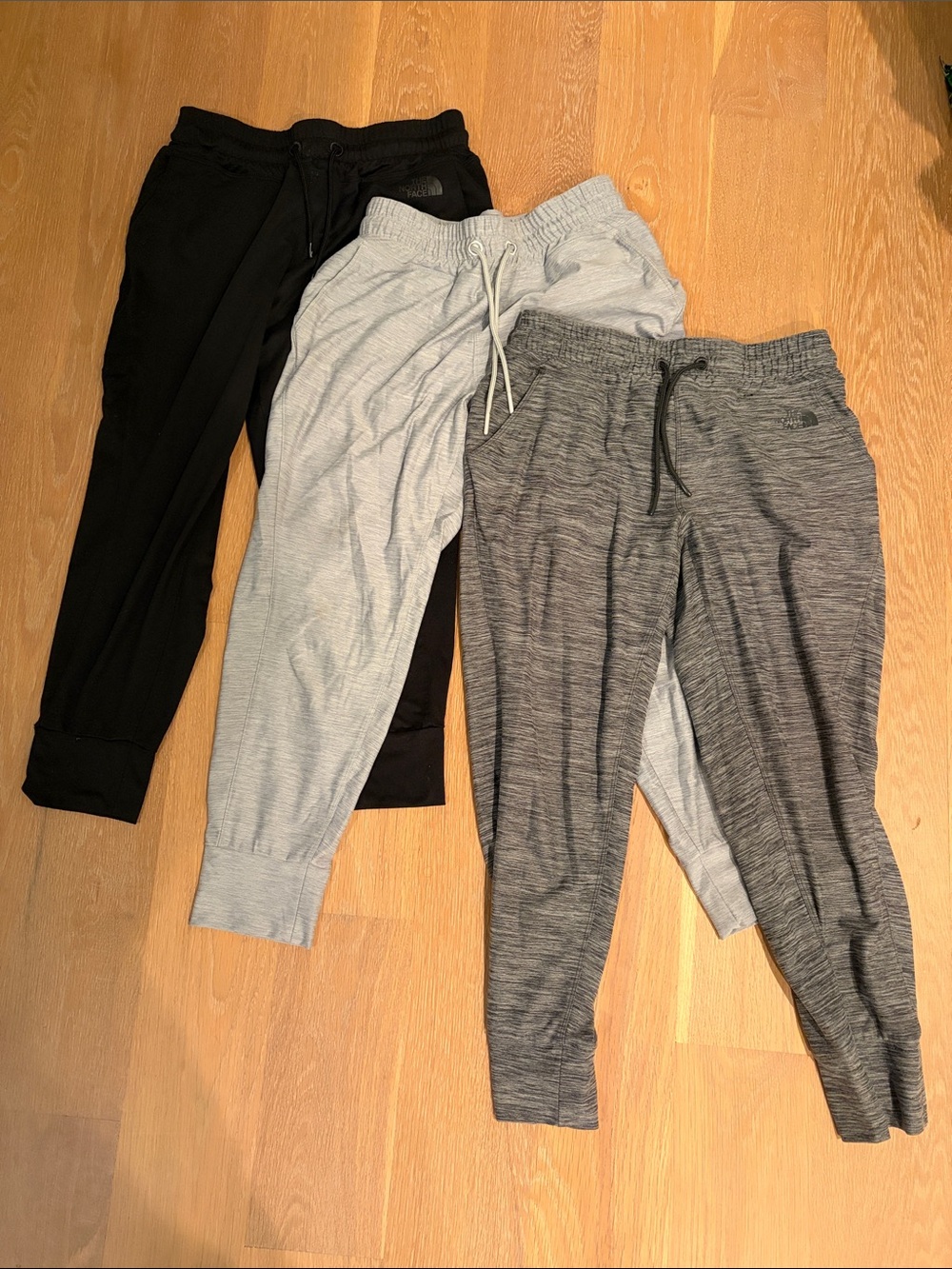 The North Face women joggers 3 pair. Black, light grey, heather dark grey. Small